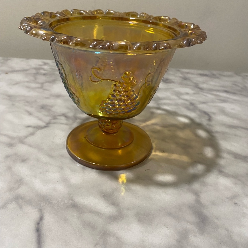 vintage Indiana carnival glass with harvest grapes pattern and open laced edge